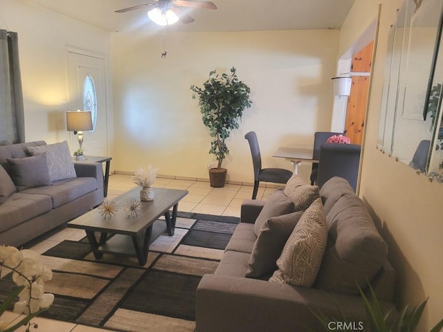 living room with ceiling fan and light tile patterned floors