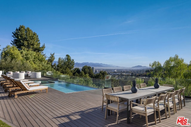 wooden terrace with a mountain view