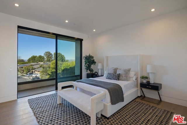 bedroom with wood-type flooring