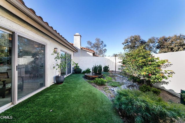 view of yard with fence