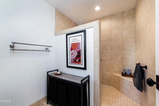 bathroom featuring recessed lighting and a walk in shower