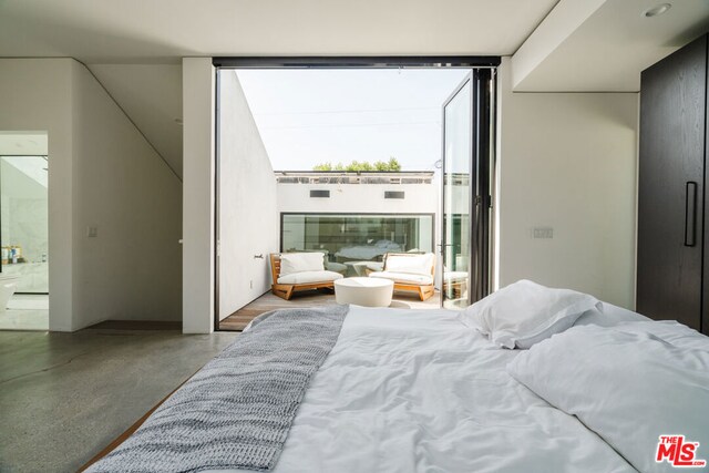 bedroom with expansive windows