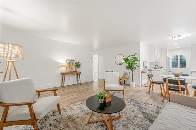 living room with light wood-type flooring