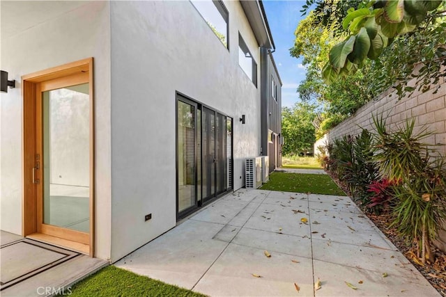 view of home's exterior with a patio