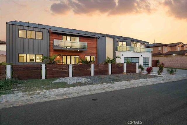 contemporary house featuring a balcony