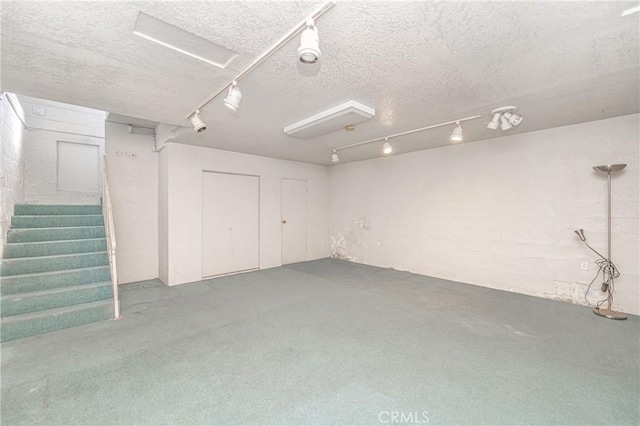 basement with a textured ceiling