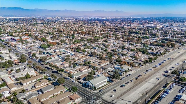 drone / aerial view featuring a mountain view