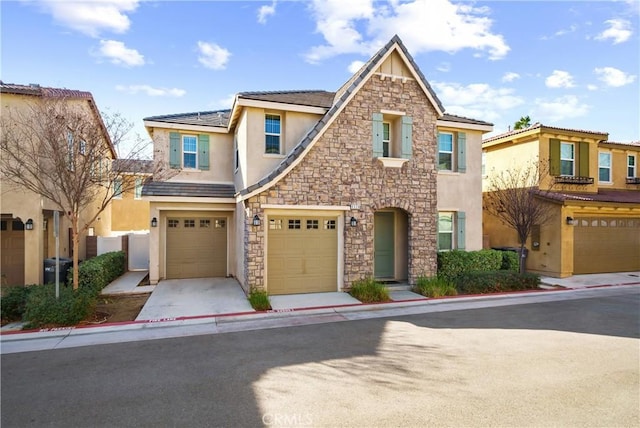 view of front of home with a garage