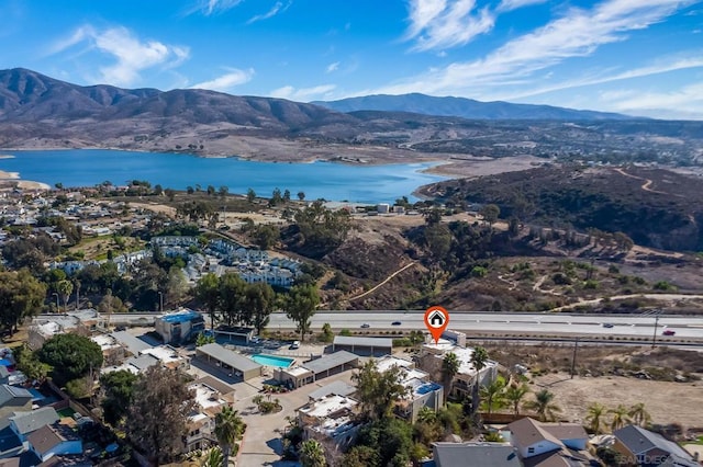 bird's eye view featuring a water and mountain view