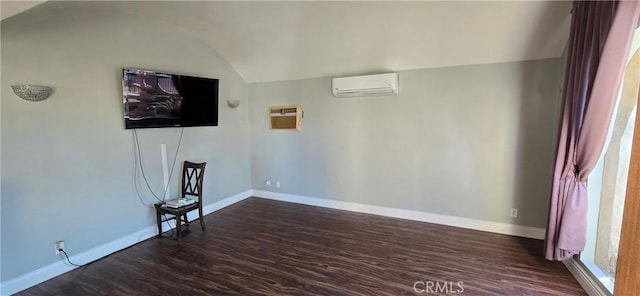 unfurnished living room featuring dark hardwood / wood-style floors and an AC wall unit