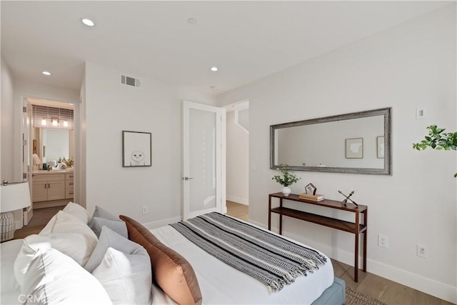 1700 Perkins Ln, Redondo Beach, CA 90278 - bedroom featuring wood finished floors, recessed lighting, and ensuite bath