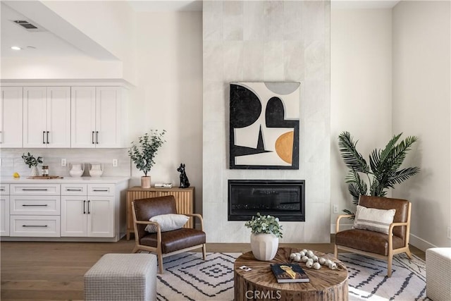 1700 Perkins Ln, Redondo Beach, CA 90278 - living area with a tile fireplace, wood finished floors, and recessed lighting