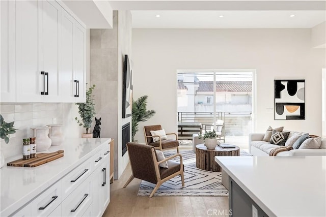 1700 Perkins Ln, Redondo Beach, CA 90278 - living room with light wood-style floors and recessed lighting