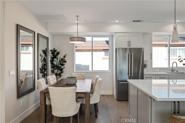 1700 Perkins Ln, Redondo Beach, CA 90278 - dining room with light wood-style floors and recessed lighting