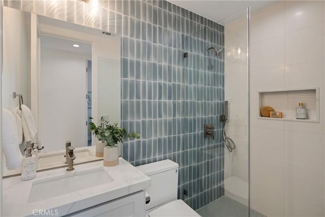 1700 Perkins Ln, Redondo Beach, CA 90278 - bathroom featuring tile walls, a walk in shower, and vanity
