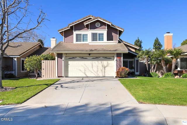 front facade with a front yard and a garage