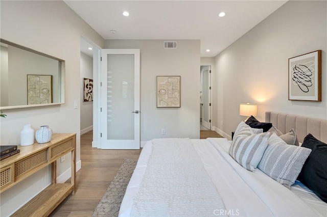 bedroom featuring light hardwood / wood-style flooring