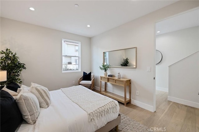 bedroom featuring light hardwood / wood-style flooring