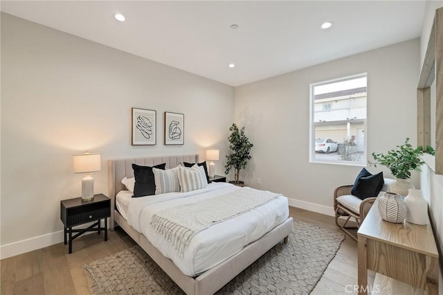 bedroom featuring light wood-type flooring