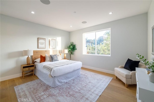 bedroom featuring light hardwood / wood-style flooring