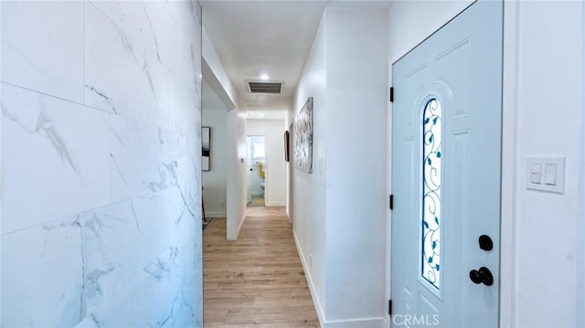 hallway featuring light hardwood / wood-style floors