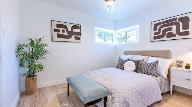 bedroom featuring ceiling fan and light wood-type flooring