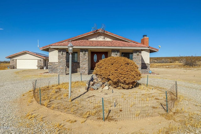 view of front of property featuring a garage