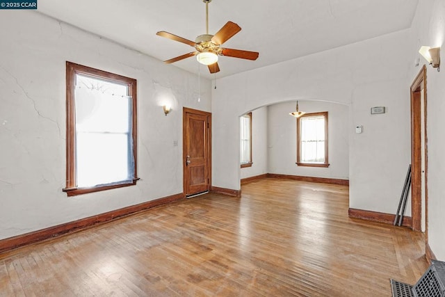 empty room featuring light hardwood / wood-style floors and ceiling fan