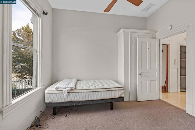 sitting room with carpet floors and ceiling fan