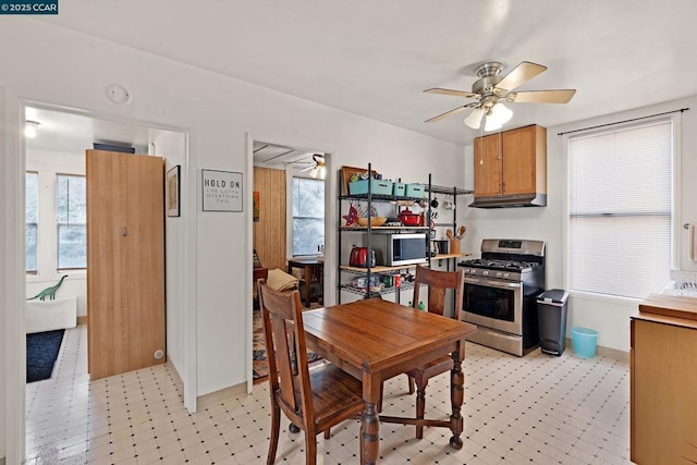 dining area with ceiling fan