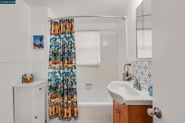 bathroom featuring vanity and shower / tub combo