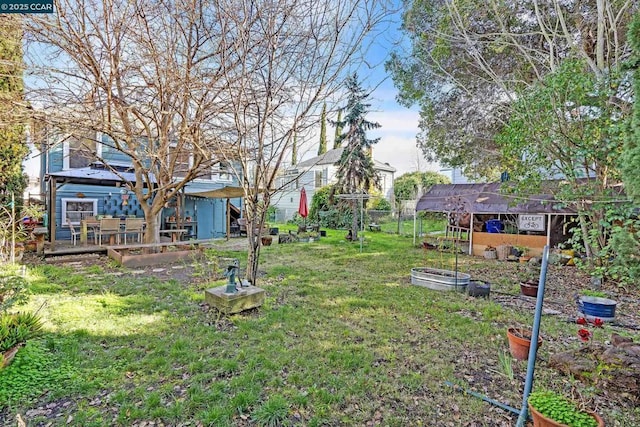 view of yard featuring a deck