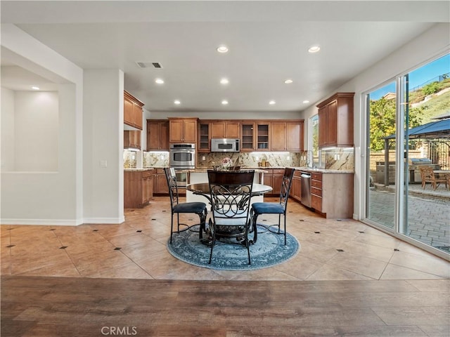 dining space with light tile patterned flooring