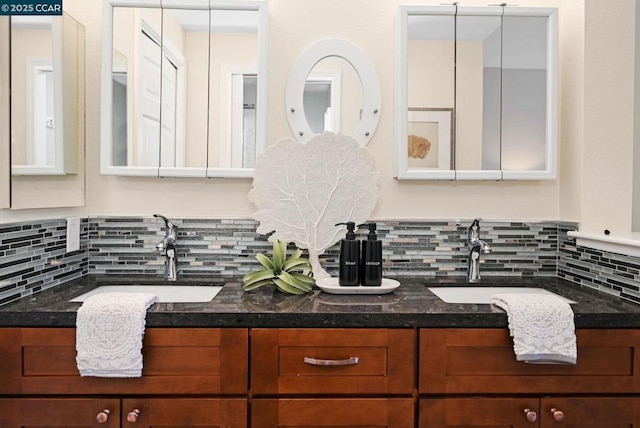 bathroom with tasteful backsplash and vanity