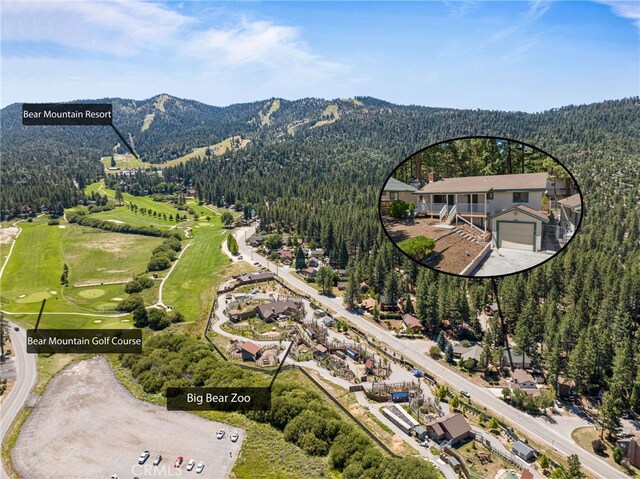 bird's eye view with a mountain view