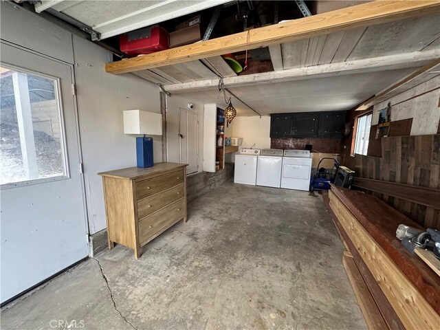 garage featuring independent washer and dryer