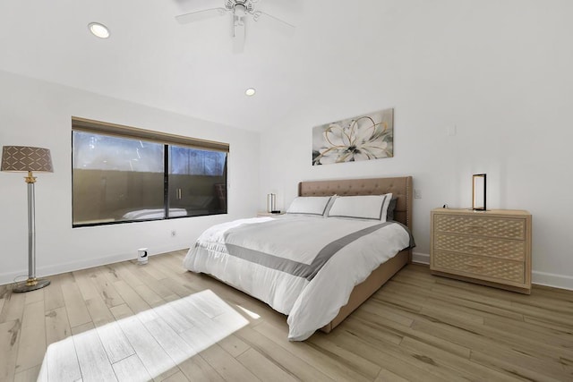 bedroom with lofted ceiling, ceiling fan, and wood-type flooring