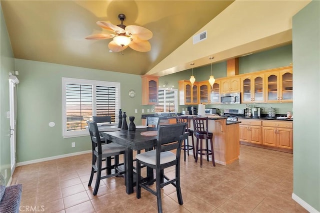 32758 Spinel Rd, Lucerne Valley, CA 92356 - dining area featuring baseboards, visible vents, light tile patterned floors, and a ceiling fan