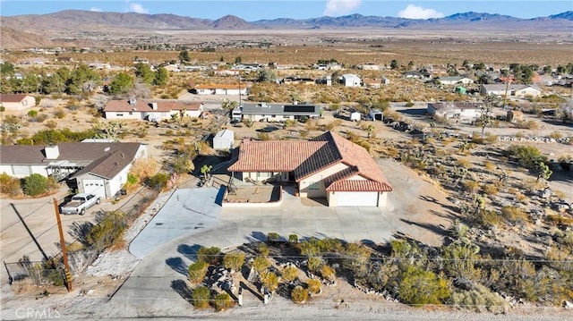 drone / aerial view featuring a mountain view