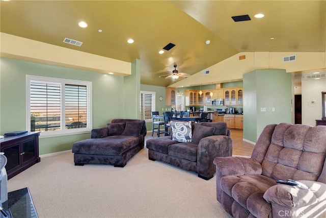 32758 Spinel Rd, Lucerne Valley, CA 92356 - living area featuring light colored carpet, visible vents, ceiling fan, and lofted ceiling