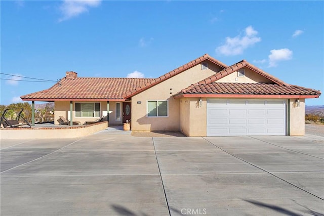 view of front of house with a garage