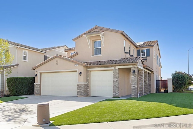 mediterranean / spanish-style home with a front lawn and a garage