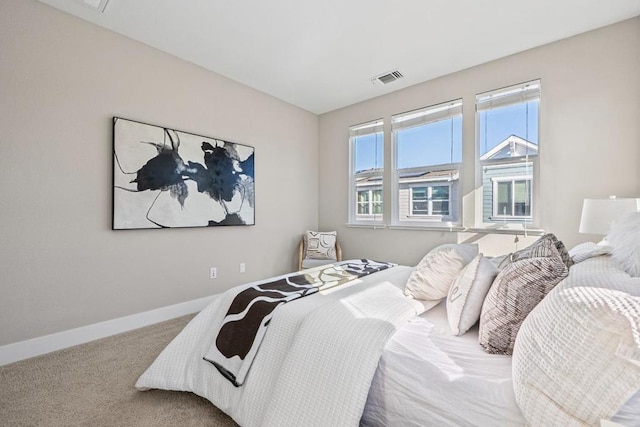 bedroom featuring carpet