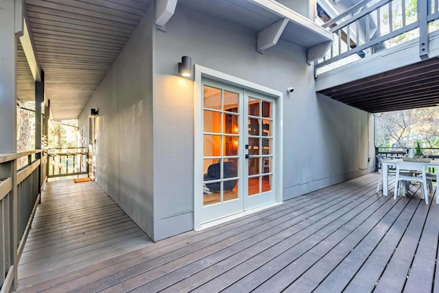 wooden terrace featuring french doors