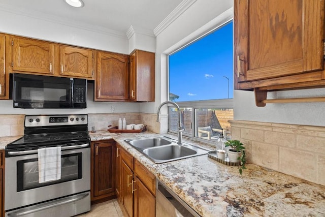 kitchen featuring light stone countertops, sink, ornamental molding, light tile patterned flooring, and electric range