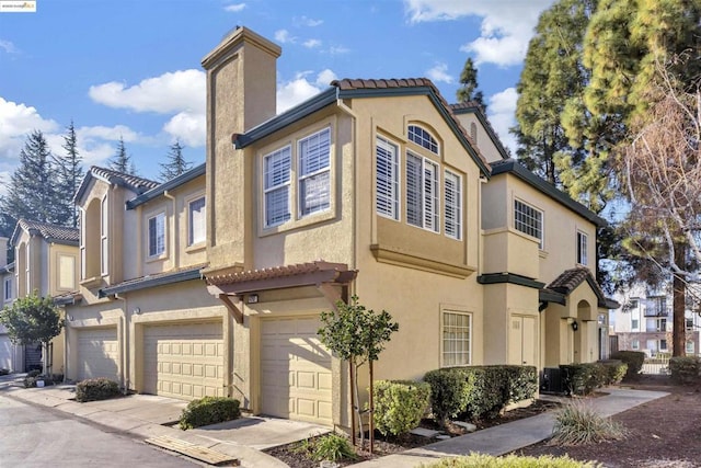 exterior space with a garage