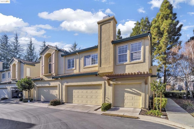 view of property featuring a garage