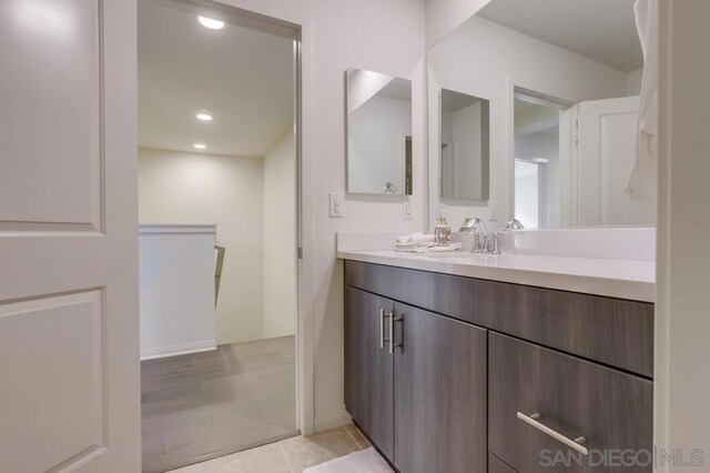 bathroom with vanity and tile patterned floors