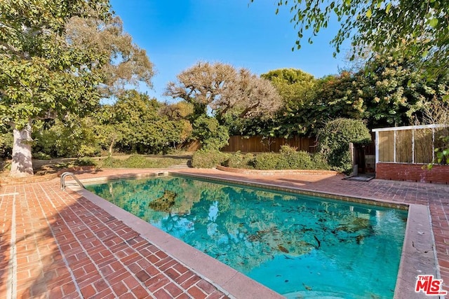 view of pool with a patio