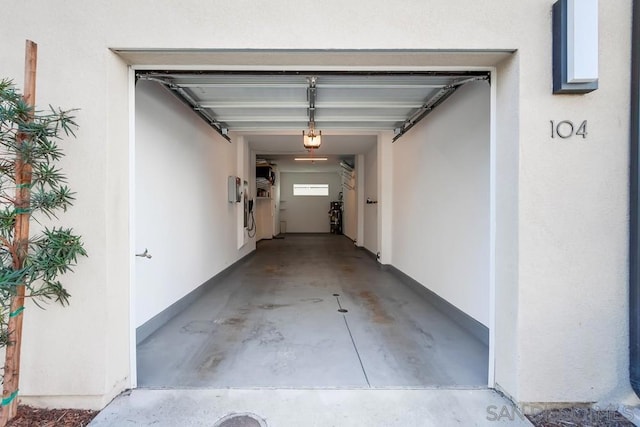 garage featuring a garage door opener